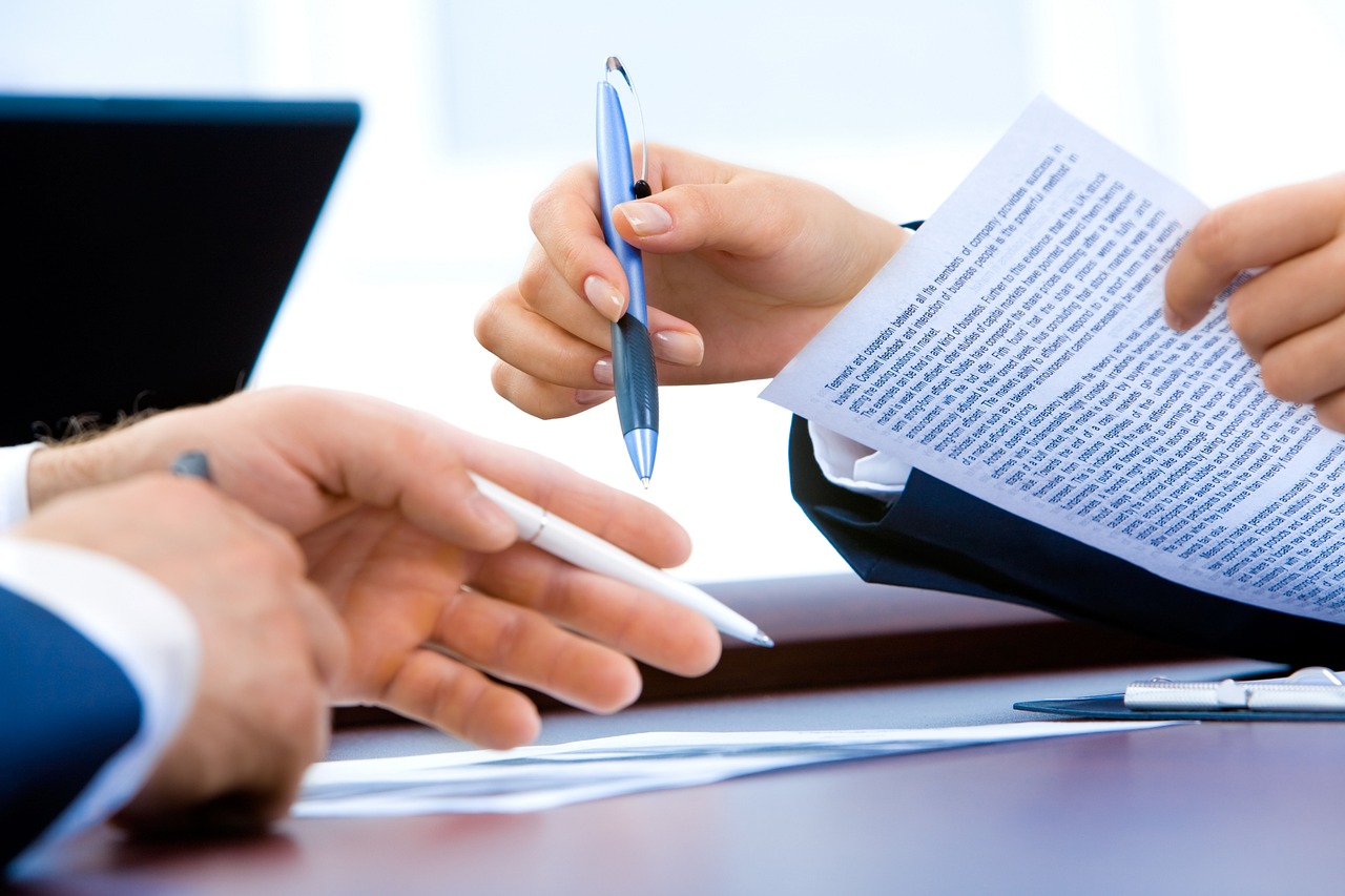 Paperwork being finalised, the compliant, well-run process behind outsourced payroll.