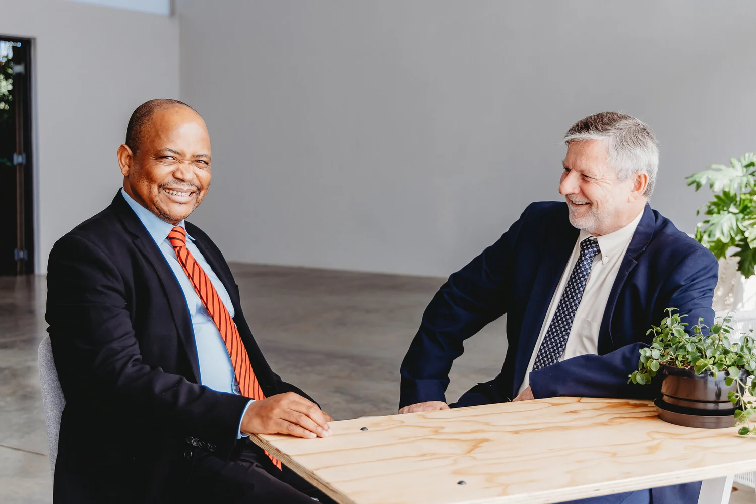 Tennant Group leadership in conversation.